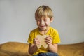 A boy, 6 years old, holds a box for milk teeth. Change of teeth Royalty Free Stock Photo