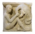 Boy with the young dragon. Metope of Modena Cathedral Royalty Free Stock Photo