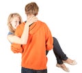 Boyfriend carrying girl in his arms Royalty Free Stock Photo