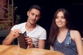 Boyfriend checking Restaurant Bill on a Date Royalty Free Stock Photo