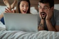 Boyfriend and girlfriend surfing the net in bed Royalty Free Stock Photo