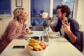 Boyfriend having surprise Valetine`s day diinner with his girlfriend Royalty Free Stock Photo