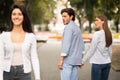 Boyfriend Looking At Other Girl Walking With Irritated Girlfriend Outdoor Royalty Free Stock Photo