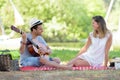 boyfriend rendering guitar song during picnic