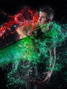 Boyish Woman in Red and Green Water Splashes Royalty Free Stock Photo