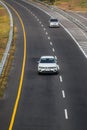 White Volkswagen Tiguan All Space driving fast on trans jawa highway