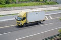 Mitsubishi Canter driving fast on the higway