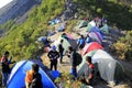 Mount Merapi climbers erect dome tents on the hiking trail to the summit