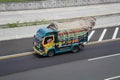 Mitsubishi Canter driving fast on the higway