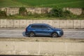 Blue Volkswagen Tiguan All Space driving fast on trans jawa highway