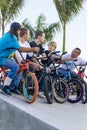 Boys on bikes at skate park event