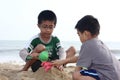 Boys Building Sand Castle Royalty Free Stock Photo