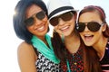 Boys come and go, but friends are forever. Closeup shot of a group of teenage girls smiling with their arms around each Royalty Free Stock Photo