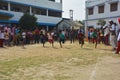 Boys competing in sports in a village school