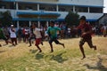 Boys competing in sports in a village school