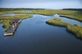 Boys on dock in marsh. Royalty Free Stock Photo