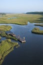 Boys on dock in marsh. Royalty Free Stock Photo