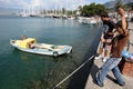 Boys fishing at Fethiye Harbour, Turkey.