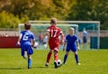 Boys Football Soccer Players Running with Ball Royalty Free Stock Photo