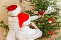 Boys and girl decorate christmas tree Royalty Free Stock Photo