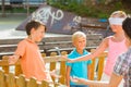 Boys with girlfriends are playing in blindfolders Royalty Free Stock Photo