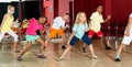 Boys and girls having dancing class in studio Royalty Free Stock Photo