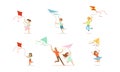 Boys and Girls Having Fun with Kites Outdoors Set, Parents and Kids Spending Good Time Together in Park Cartoon Vector Royalty Free Stock Photo