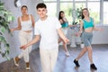 Boys and girls performing contemporary dance in studio Royalty Free Stock Photo