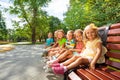 Boys and girls rest in park Royalty Free Stock Photo