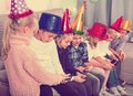 Boys and girls spending time playing with smartphones Royalty Free Stock Photo