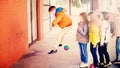 Boys and girls are standing in line at the ball game Royalty Free Stock Photo