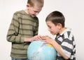 Boys and globe Royalty Free Stock Photo