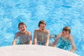 boys have fun in the pool Royalty Free Stock Photo