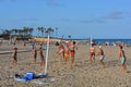 Boys having fun, playing beach volleyball