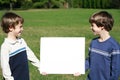 Boys Holding A Message