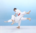 The boys in judogi are training throws Royalty Free Stock Photo