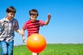 Boys kicking the ball Royalty Free Stock Photo