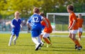 Boys Kicking Soccer Game. Young Footballers Playing Youth Football Tournament Match Royalty Free Stock Photo