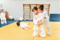 Boys in kimono fights, kid judo training Royalty Free Stock Photo