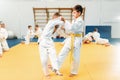 Boys in kimono fights, kid judo training Royalty Free Stock Photo