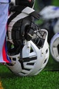 Boys lacrosse helmet at players side. Royalty Free Stock Photo