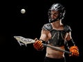 Boys lacrosse player keeping his eye on the ball
