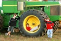 Boys and a Large Tractor Royalty Free Stock Photo