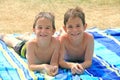 Boys Laying on Beach Towels Royalty Free Stock Photo