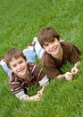 Boys Laying in Grass Royalty Free Stock Photo