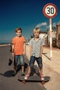 Boys on longboard skate Royalty Free Stock Photo