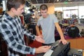 Boys in music store