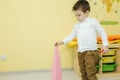 Boys play in different intelectual games in preschool classroom