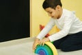 Boys play in different intelectual games in preschool classroom