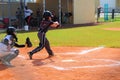 Boys playing baseball, strike